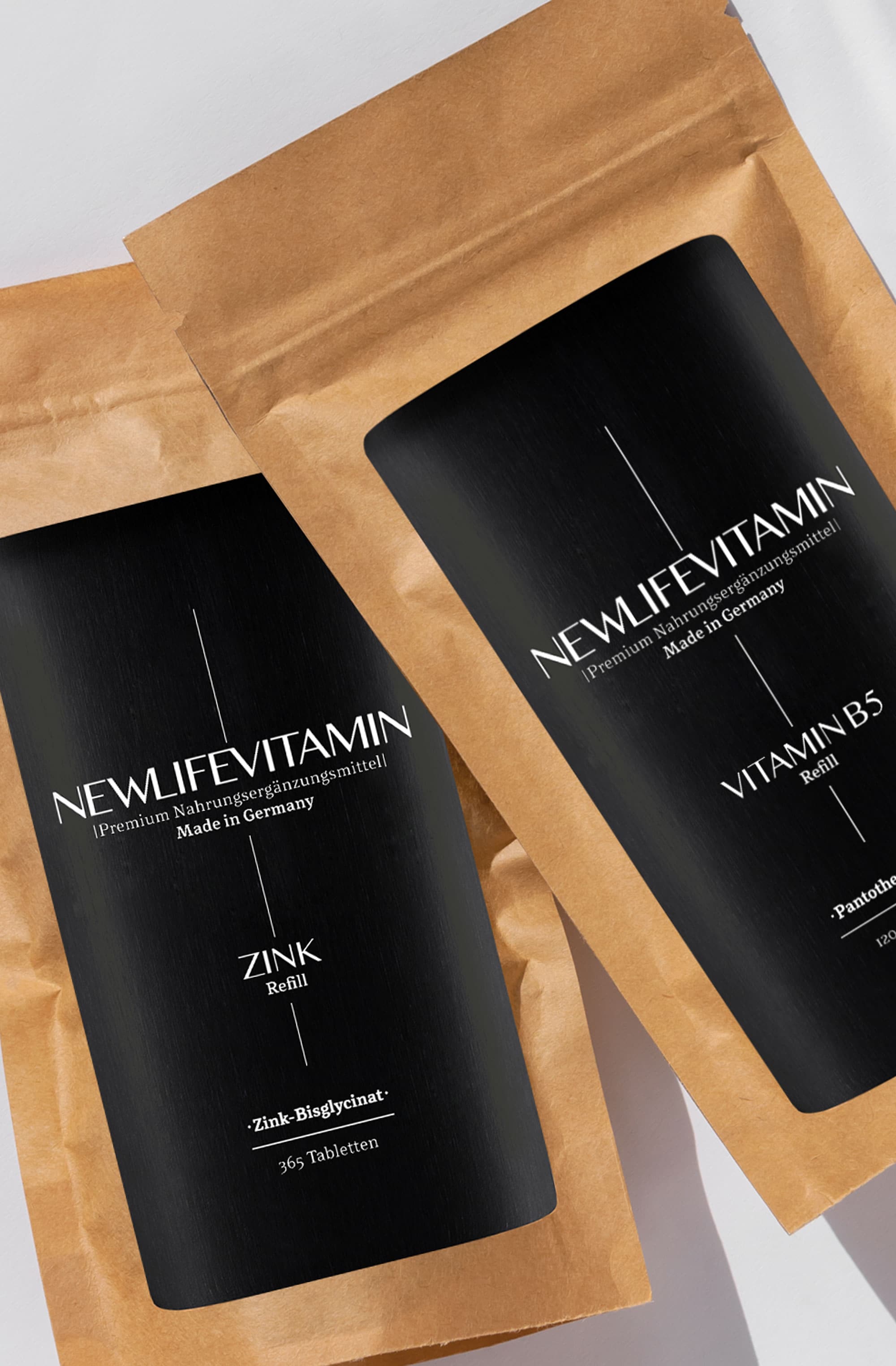 Zwei Refill-Tüten der Marke Newlifevitamin mit Produktnamen Zink und Vitamin B5